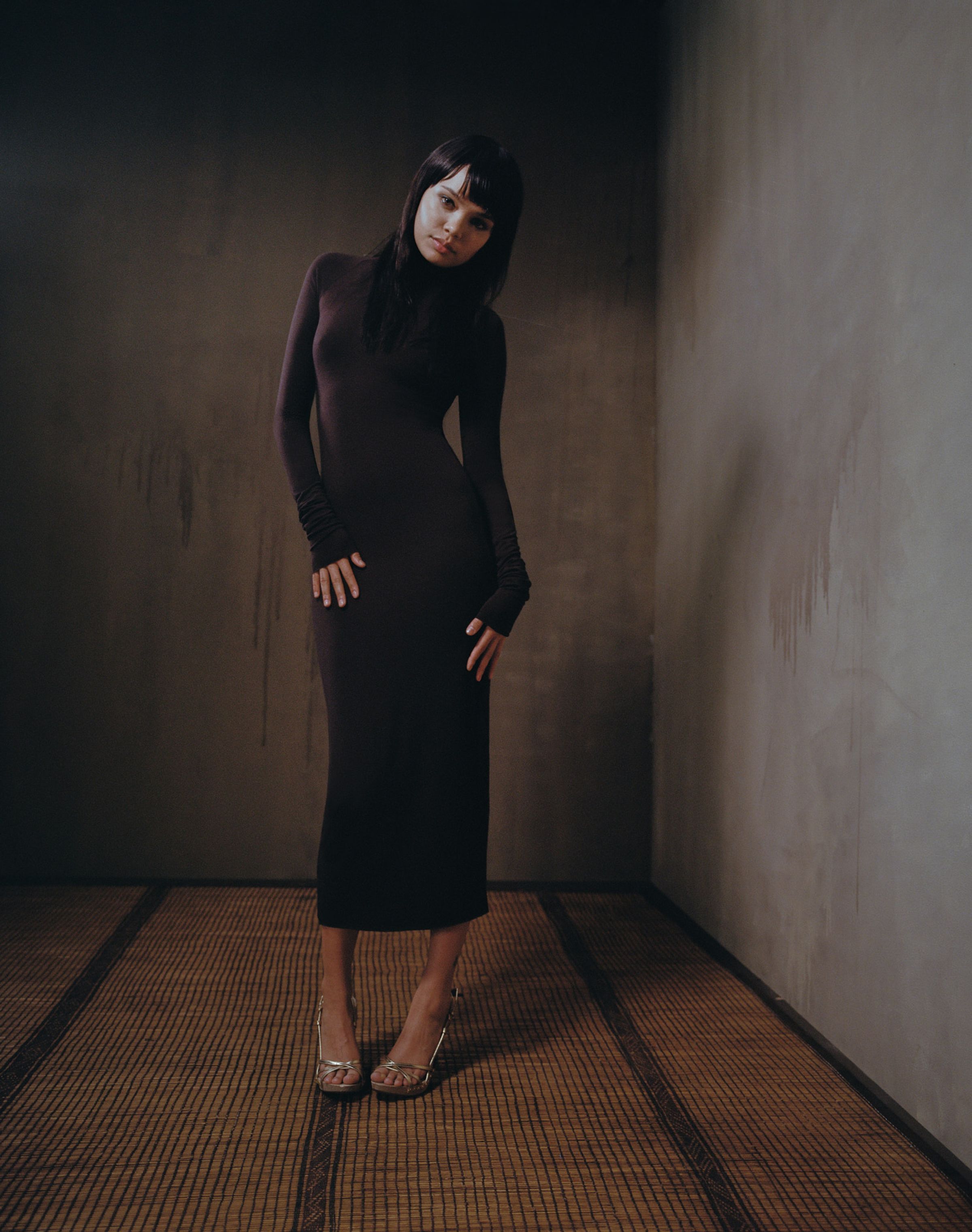 Tank Air FW23 ready-to-wear shot in Los Angeles by Erika Kamano. Model wearing the Double Scrunch Dress in Chocolate in room.