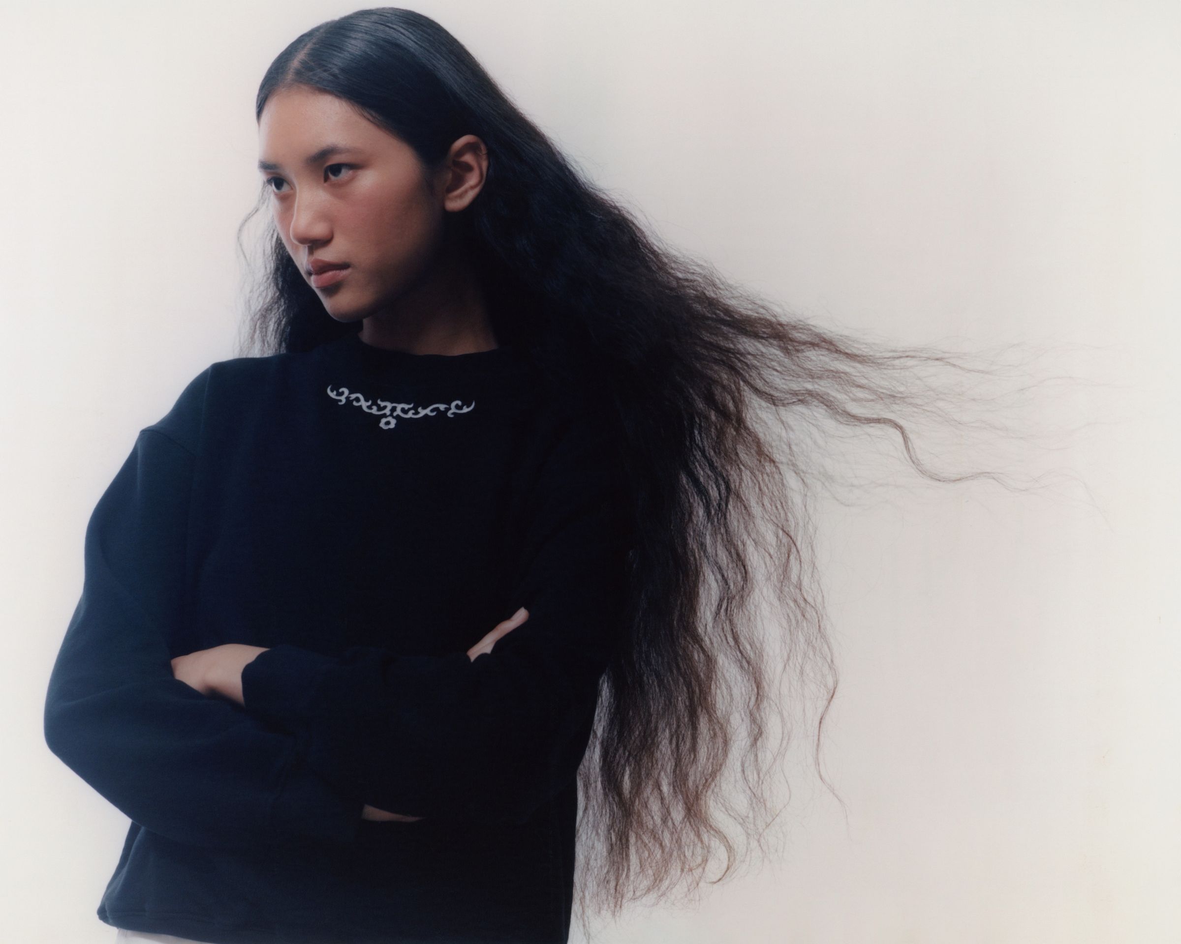 Tank Air SS20 Ready-to-Wear shot in Los Angeles by Erika Kamano. Model in the Ceremony Sweater in studio.