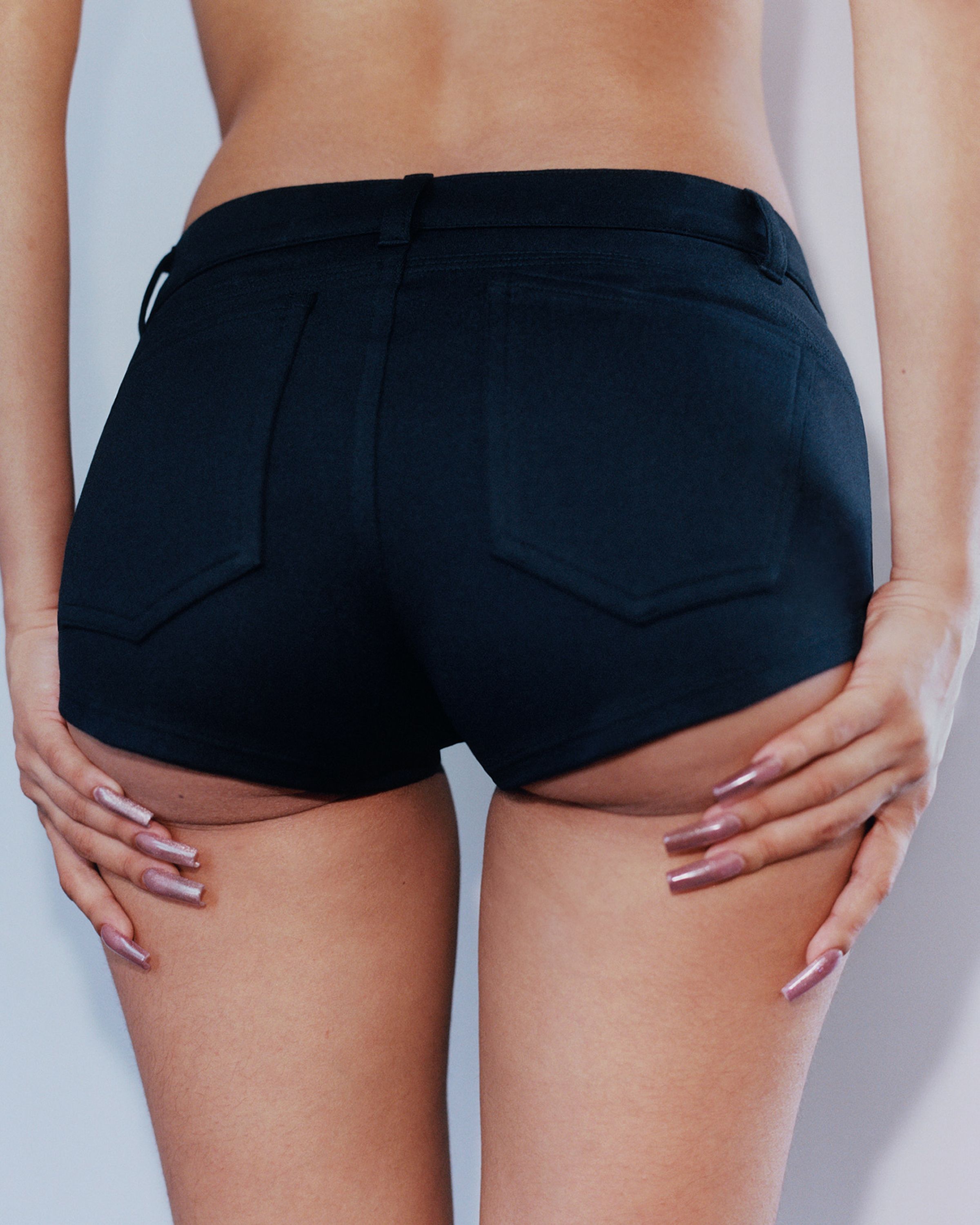 Tank Air SS24 Essentials shot in Los Angeles by Alex Leese. Model wearing the Hot Pants from back in a detail shot.