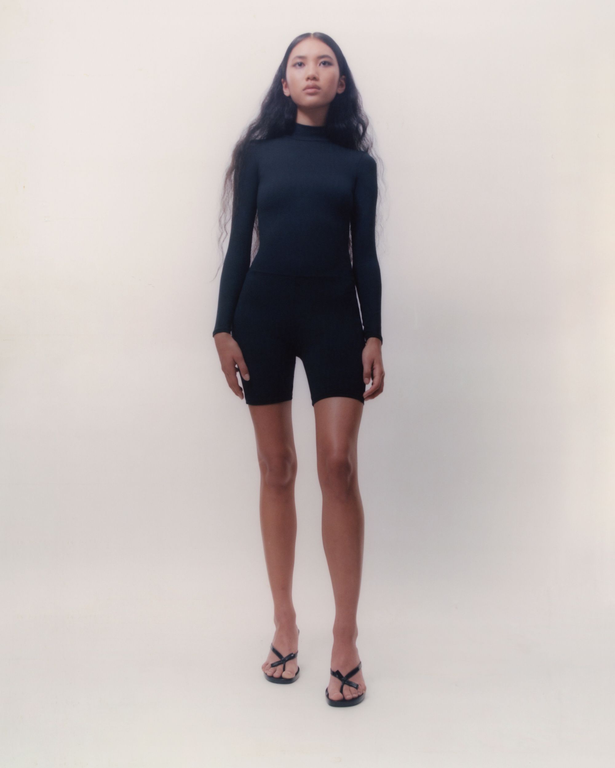 Tank Air SS20 Ready-to-Wear shot in Los Angeles by Erika Kamano. Model wearing the Turtleneck Bodysuit in studio.