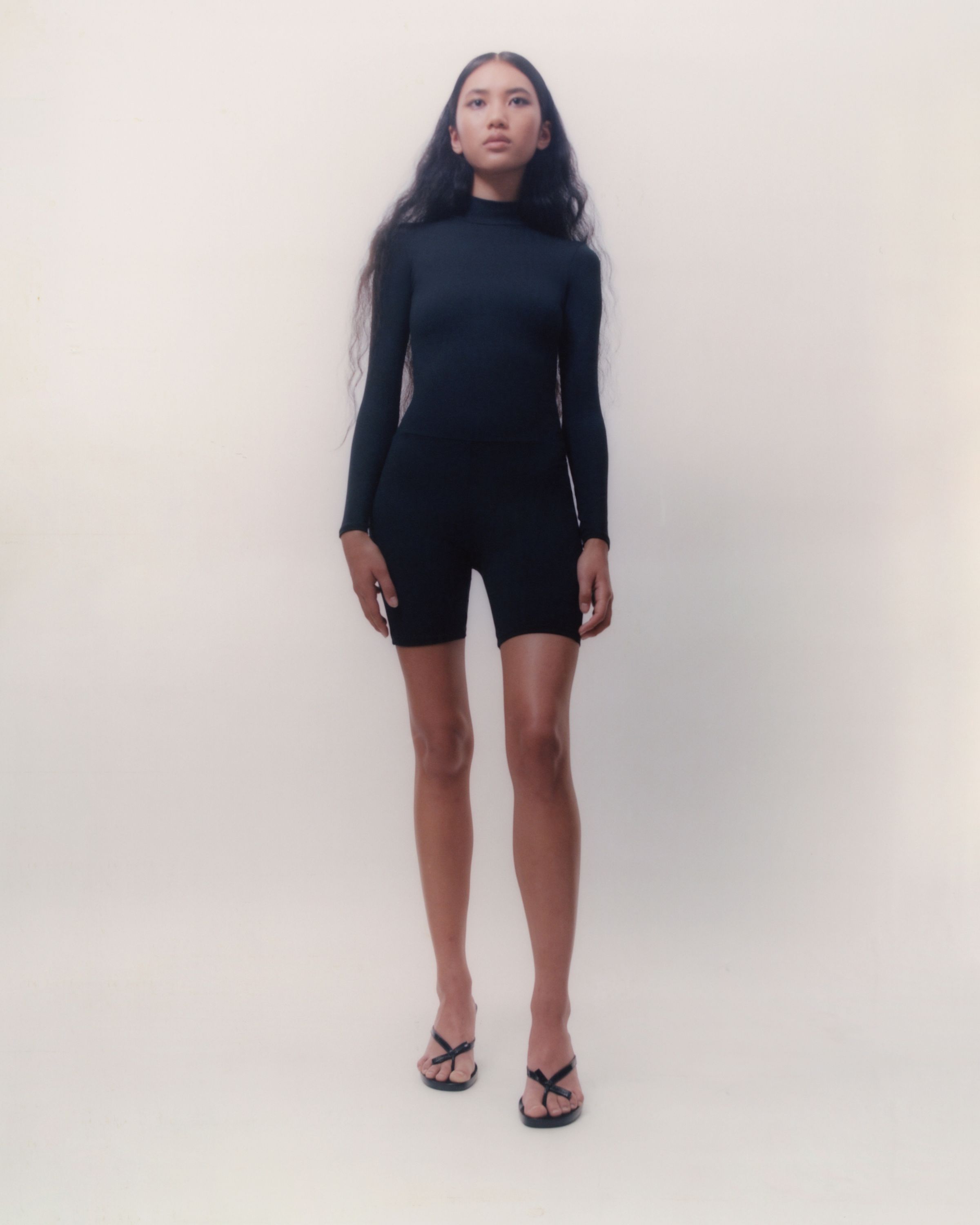 Tank Air SS20 Ready-to-Wear shot in Los Angeles by Erika Kamano. Model wearing the Turtleneck Bodysuit in studio.