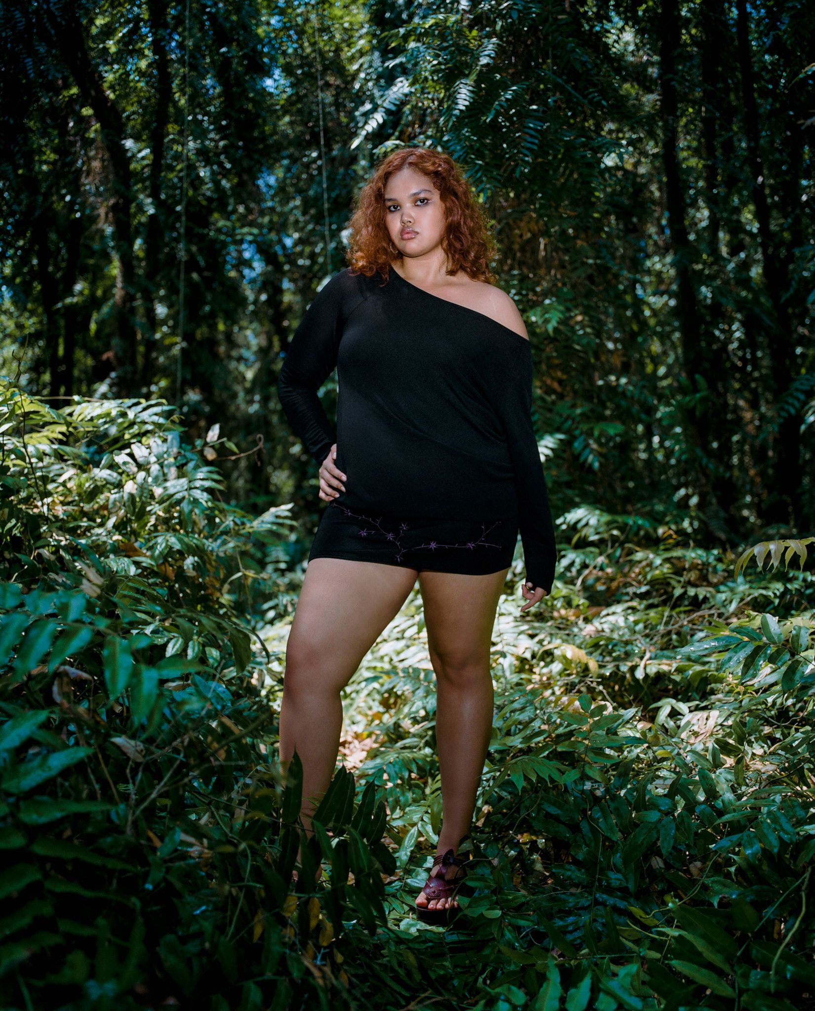 Tank Air SS24 ready-to-wear shot in Bangkok by Erika Kamano. Model wearing the Baby Leaf Mini Dress in Black in tropical forest.