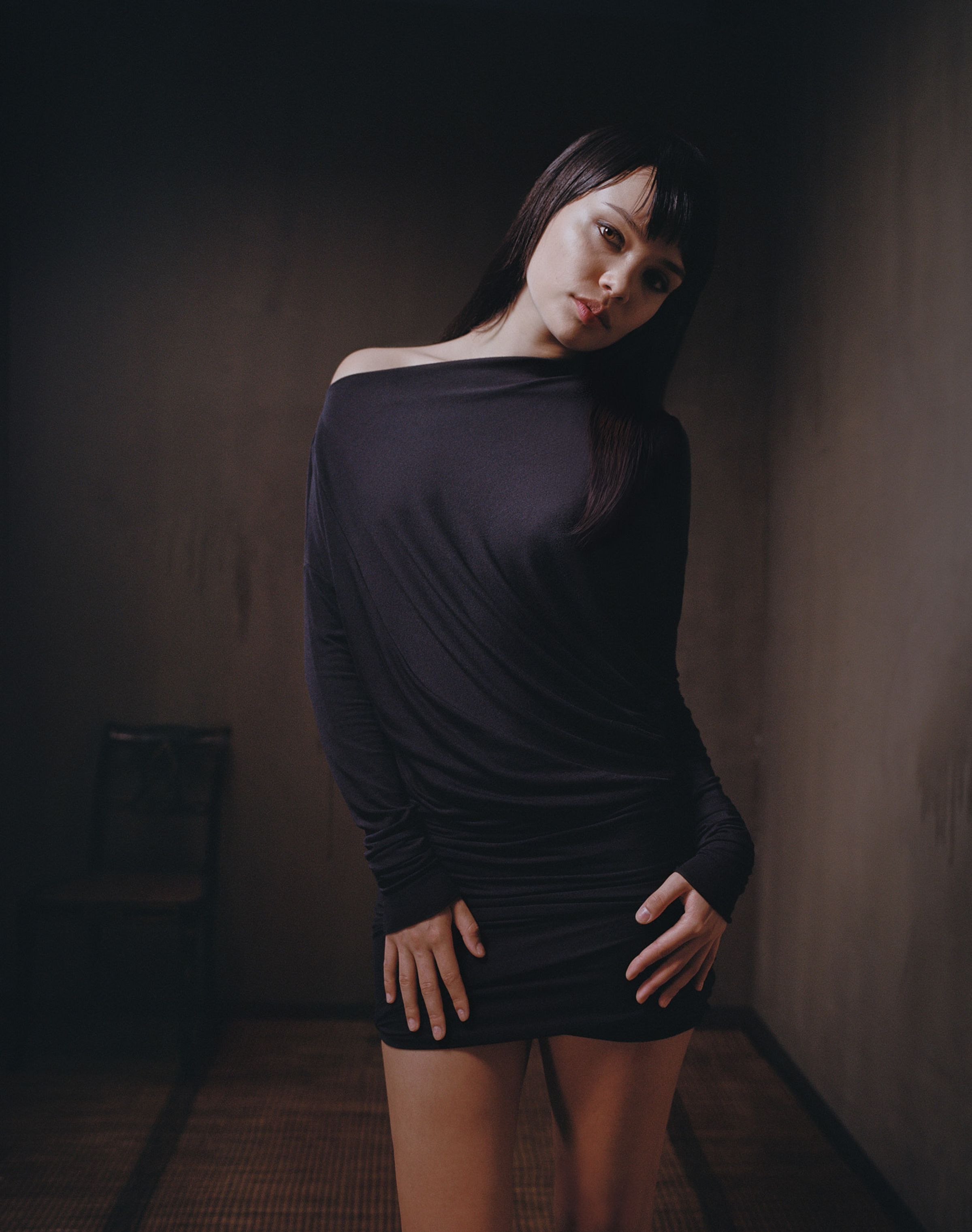 Tank Air FW23 ready-to-wear shot in Los Angeles by Erika Kamano. Model wearing the Siam Twist Mini Dress in Black in room.