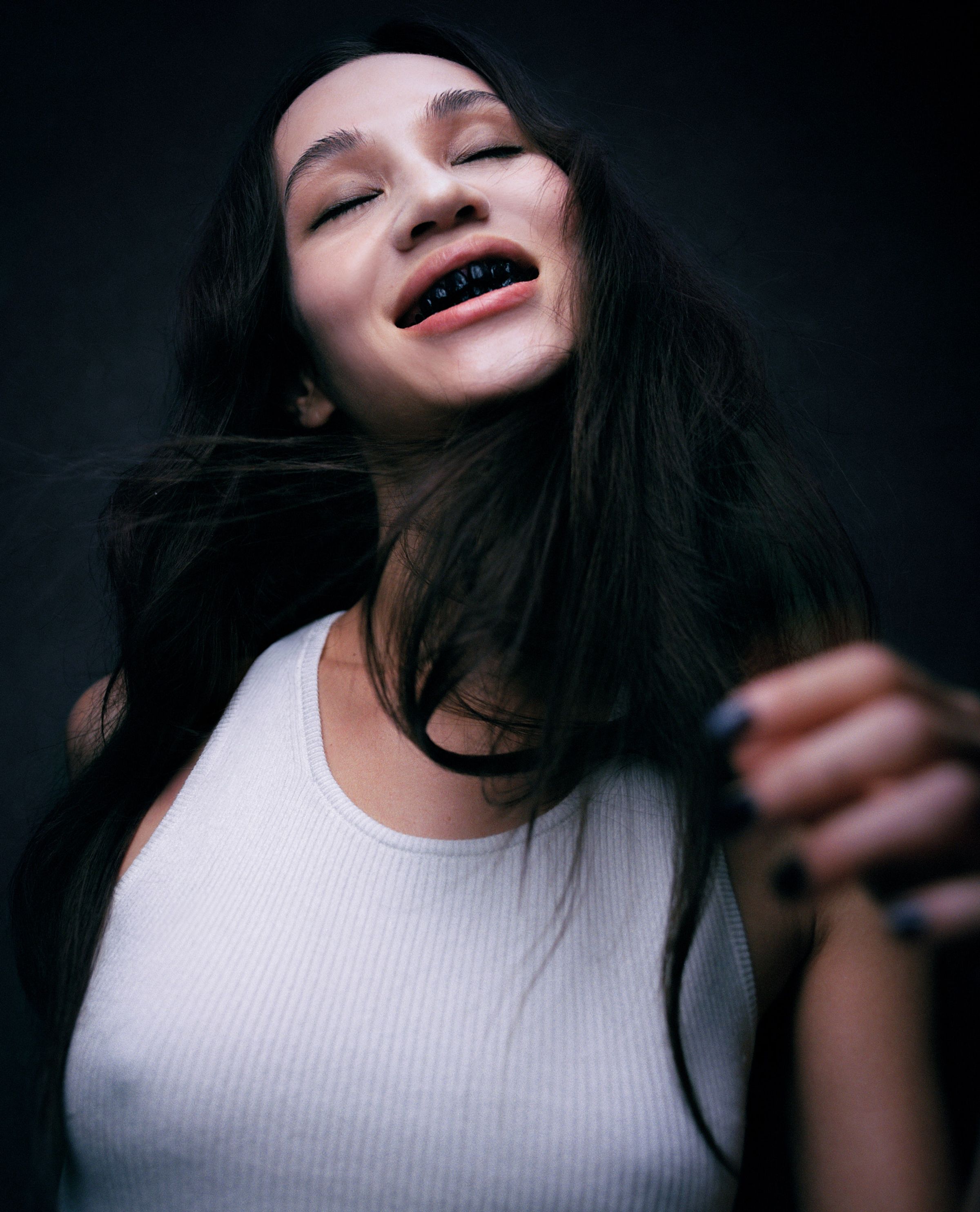 Tank Air FW24 ready-to-wear shot in Tokyo by Erika Kamano. Model wearing the Cute Knit Tank in Milk in a portrait.