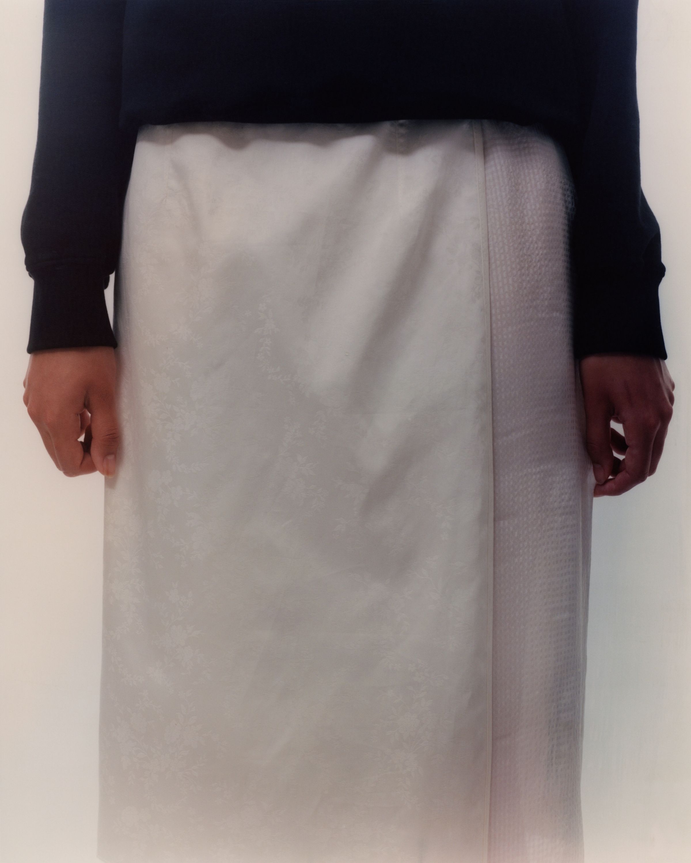 Tank Air SS20 Ready-to-Wear shot in Los Angeles by Erika Kamano. Model in the Layered Silk Sarong in a detail view.