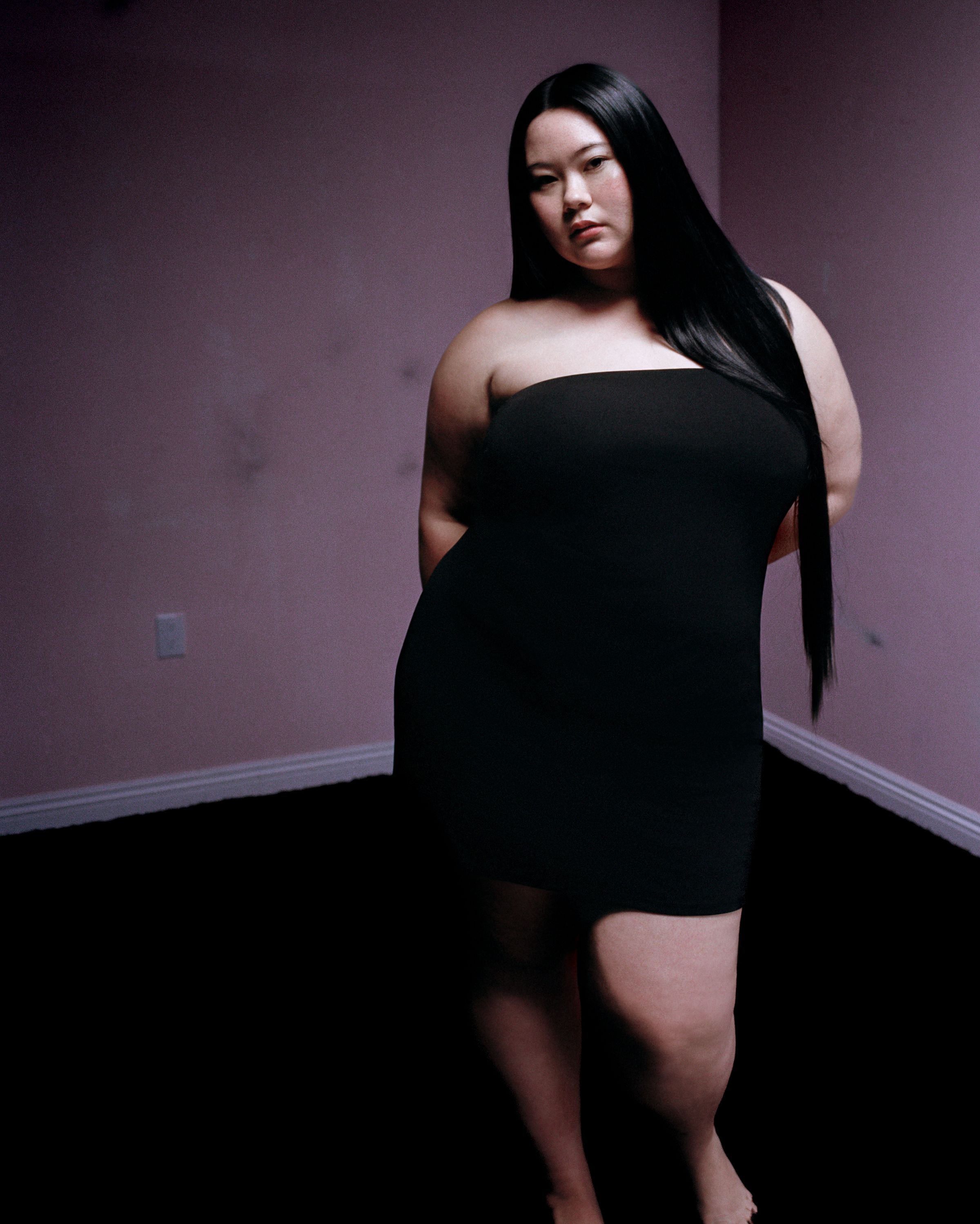Tank Air SS23 Essentials shot in Los Angeles by Erika Kamano. Model wearing the Collect $$ Strapless Mini Dress in room.