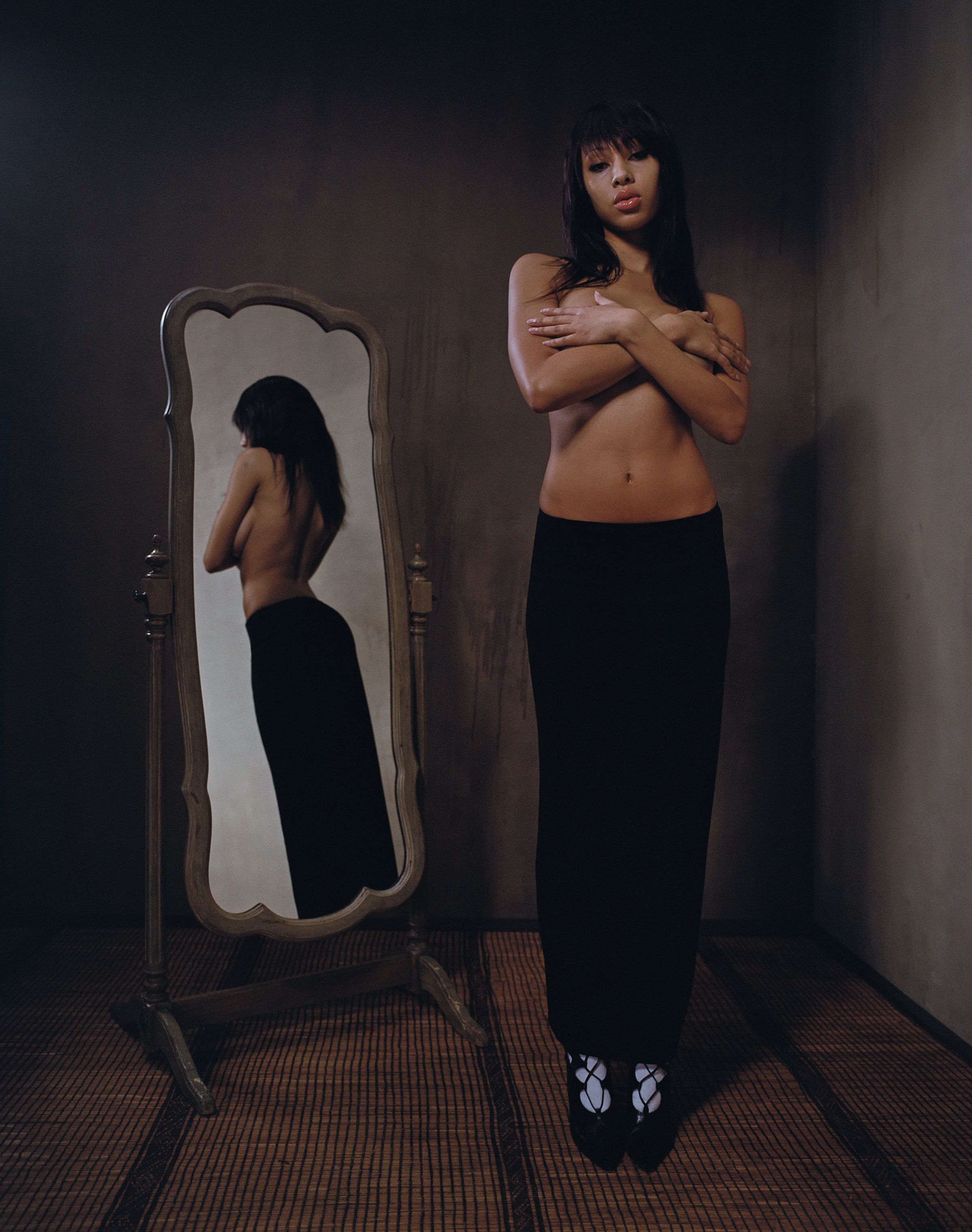 Tank Air FW23 ready-to-wear shot in Los Angeles by Erika Kamano. Model wearing the Collect $$ Maxi Skirt with mirror reflection in the background.